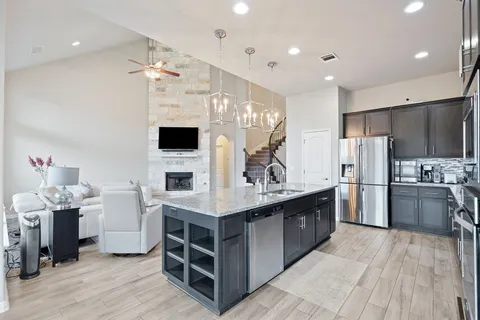 a aerial view of a house with a yard