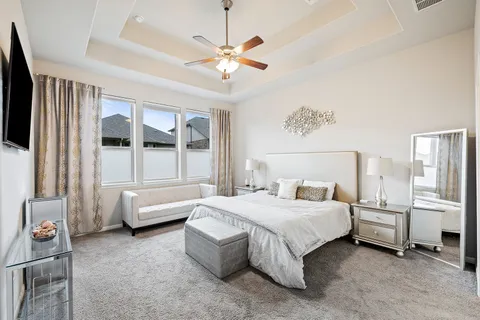 a kitchen with granite countertop kitchen island stainless steel appliances a dining table and chairs