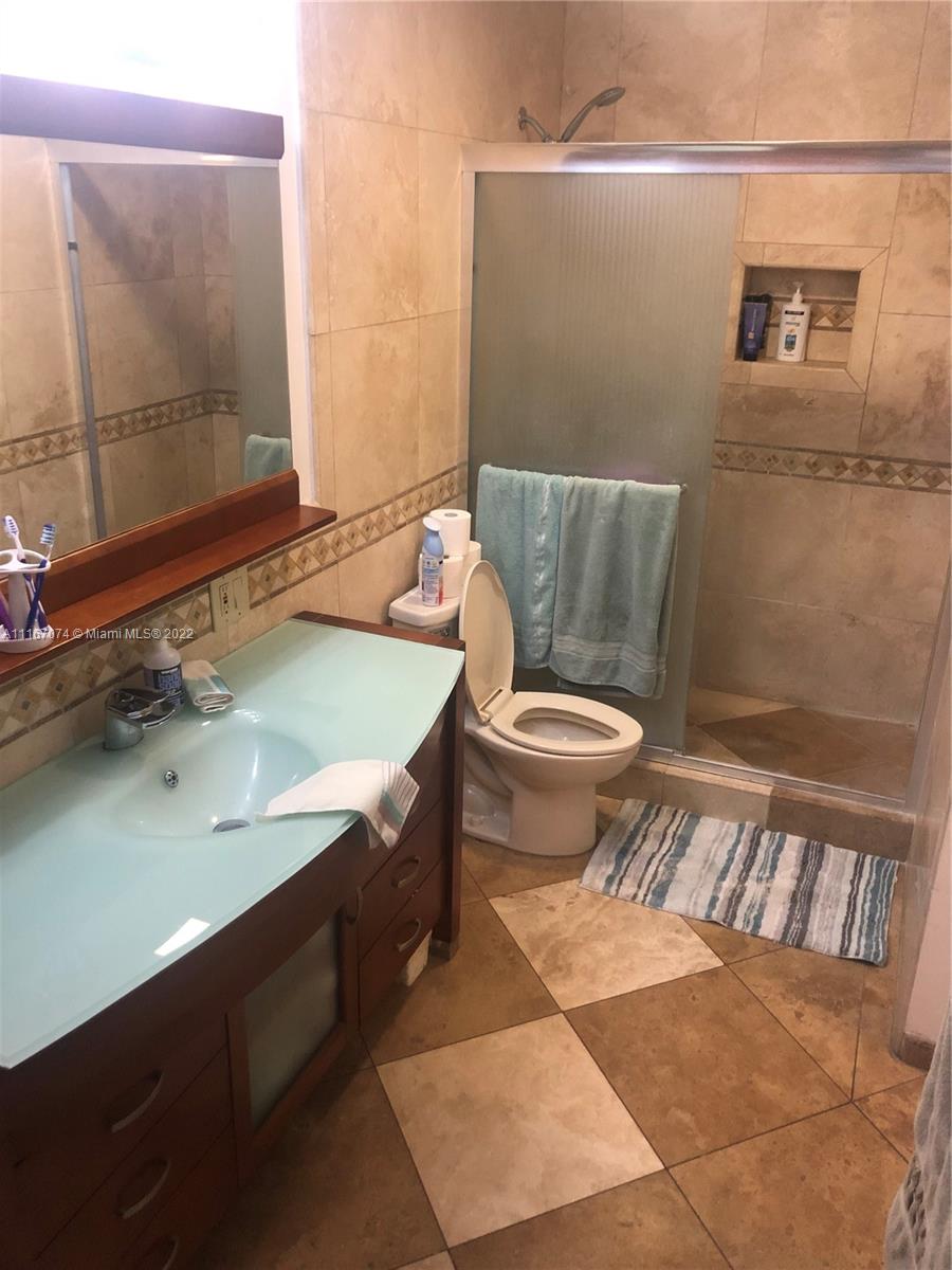 172 West 17th Street Hialeah, FL 33010 - Photo 14 of 27 a bathroom with a sink and a toilet