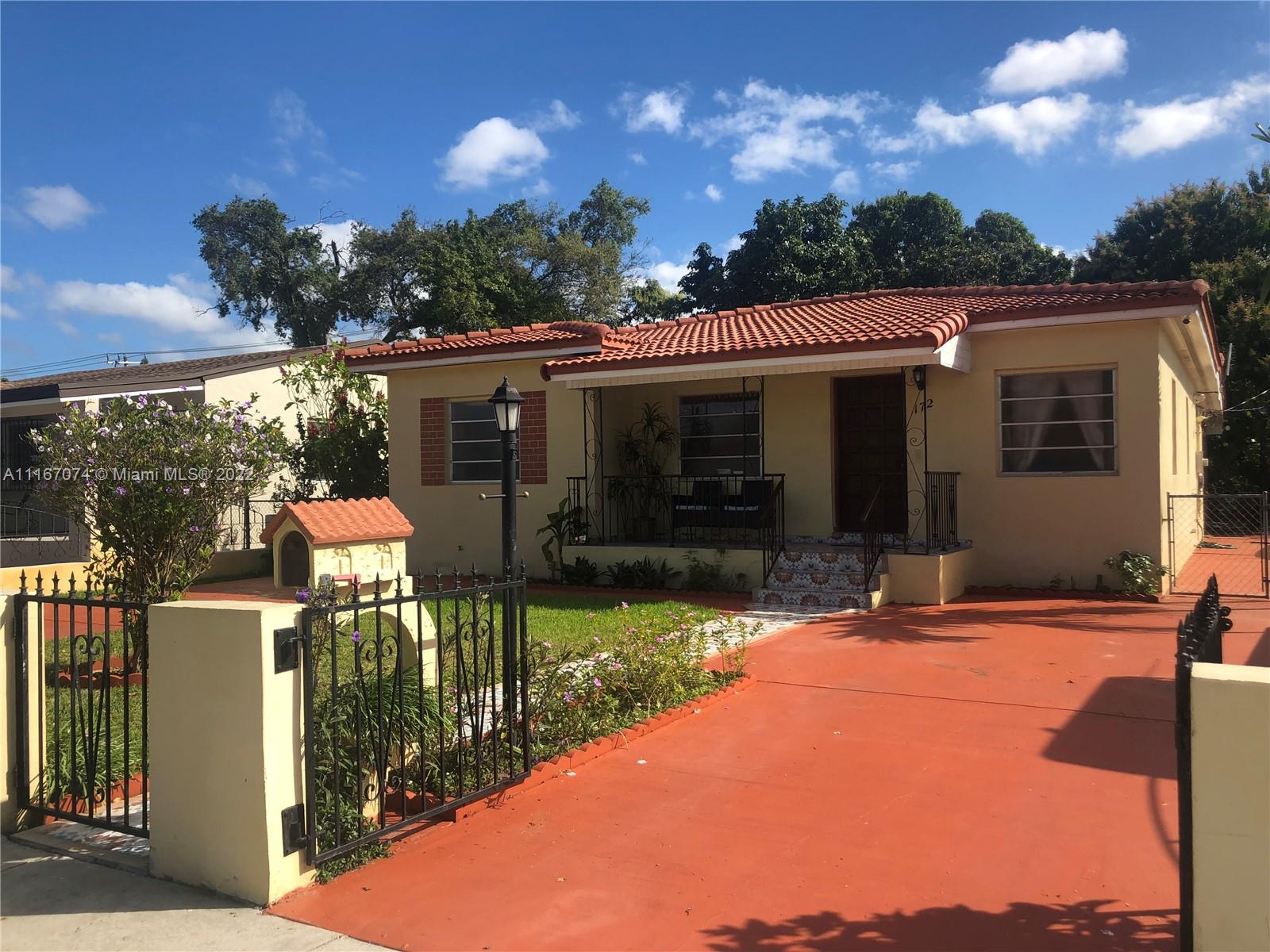 172 West 17th Street Hialeah, FL 33010 - Photo 2 of 27 a view of a house with yard and sitting area