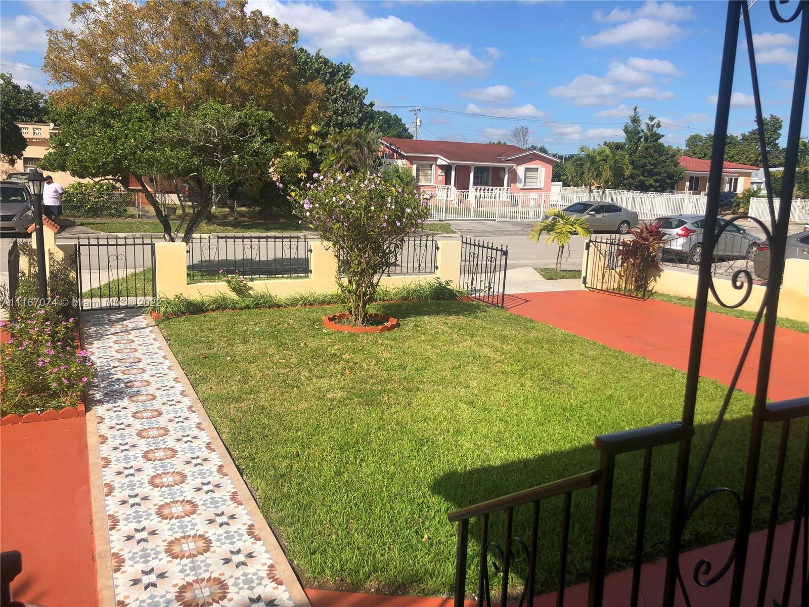 172 West 17th Street Hialeah, FL 33010 - Photo 4 of 27 a view of a backyard with sitting area