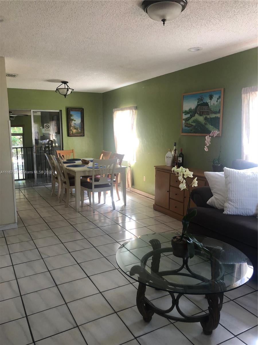 172 West 17th Street Hialeah, FL 33010 - Photo 6 of 27 a living room with furniture