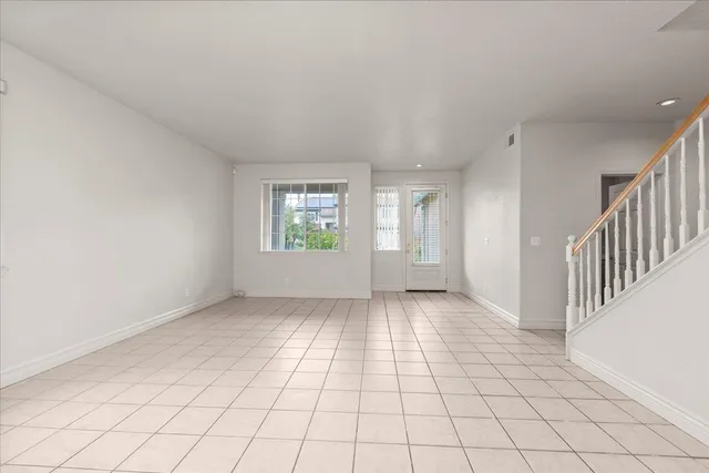 a view of an empty room and window