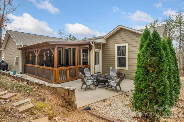 a view of a lake with furniture