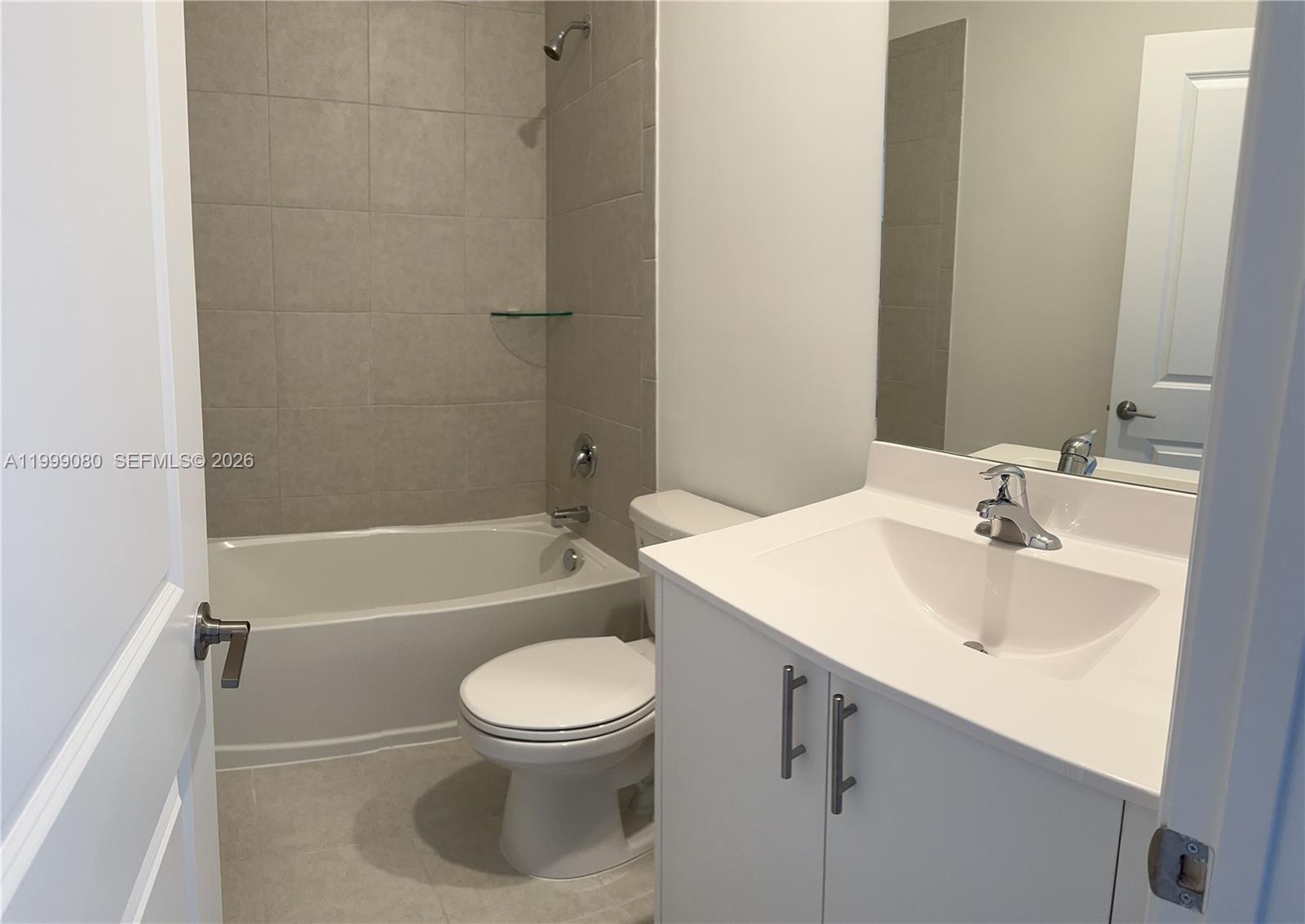 11767 Southwest 246th Terrace Homestead, FL 33032 - Photo 19 of 29 a bathroom with a sink toilet and shower