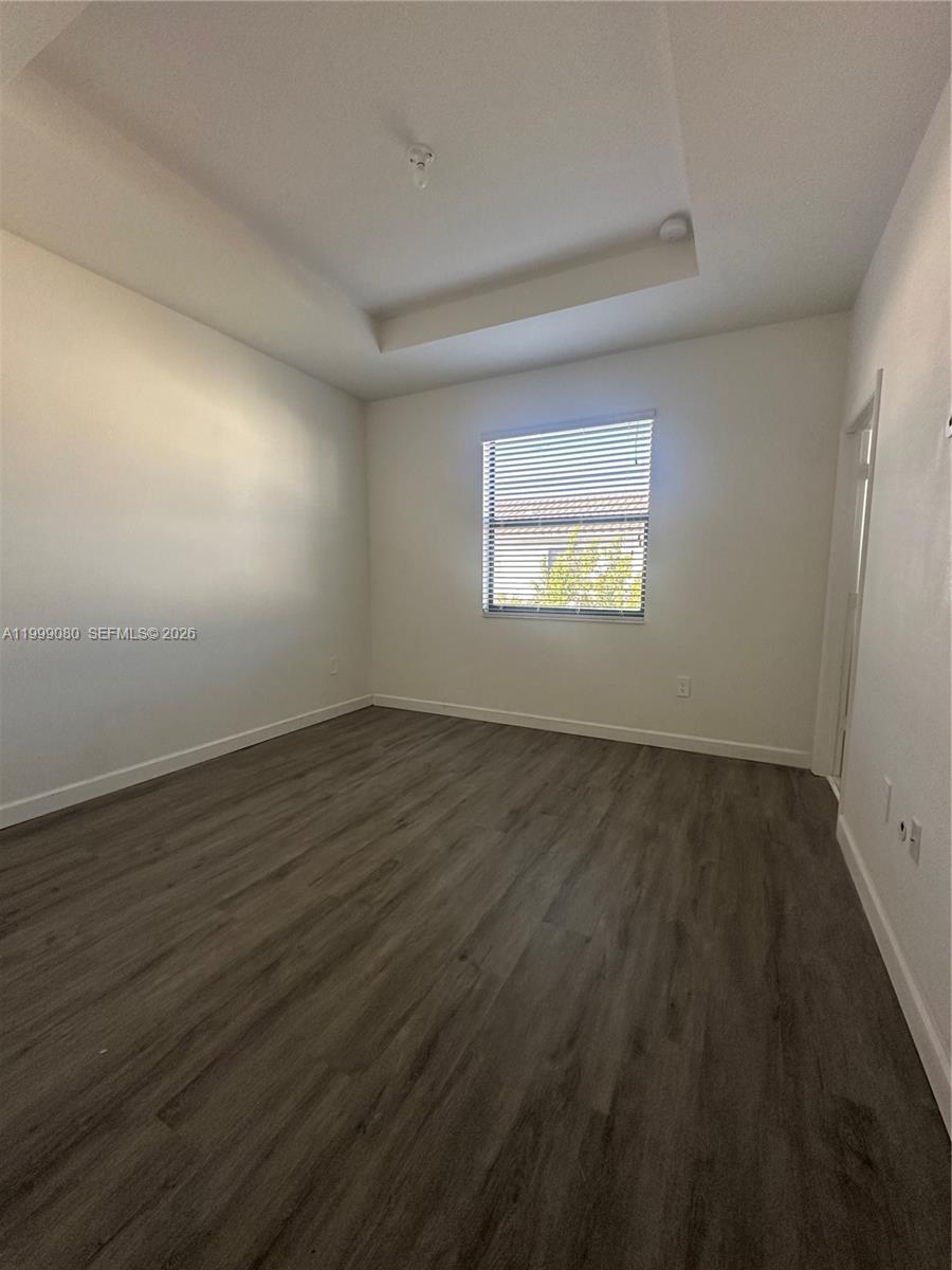 11767 Southwest 246th Terrace Homestead, FL 33032 - Photo 25 of 29 an empty room with a window