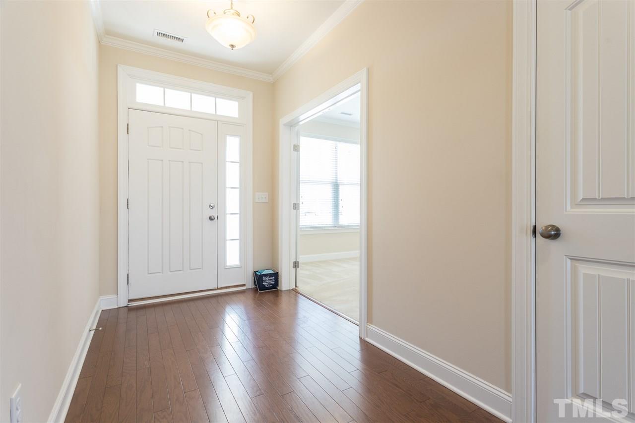 4244 Rockdell Hall Street Raleigh, NC 27616 - Photo 2 of 29 a view of wooden floor in an empty room