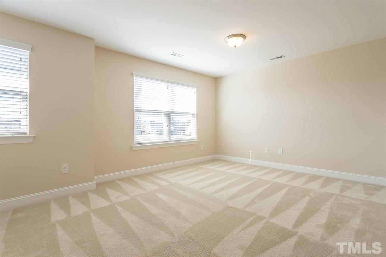 4244 Rockdell Hall Street Raleigh, NC 27616 - Photo 19 of 29 an empty room with a window