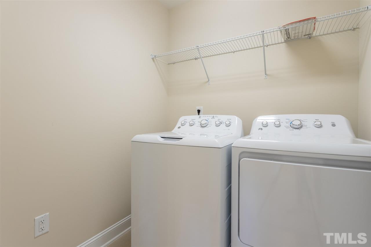 4244 Rockdell Hall Street Raleigh, NC 27616 - Photo 21 of 29 a utility room with dryer and washer