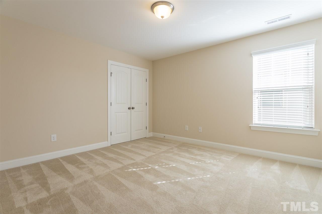 4244 Rockdell Hall Street Raleigh, NC 27616 - Photo 24 of 29 a view of an empty room with a window