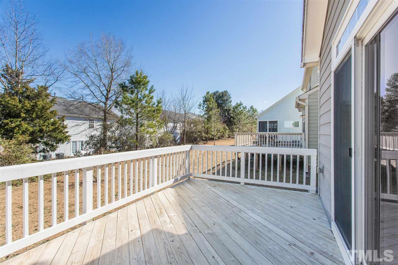 4244 Rockdell Hall Street Raleigh, NC 27616 - Photo 28 of 29 a view of balcony with wooden floor and fence