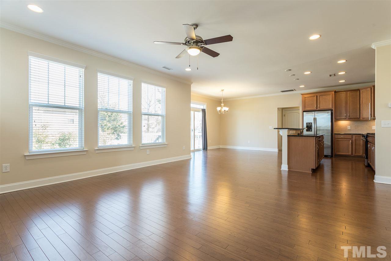 4244 Rockdell Hall Street Raleigh, NC 27616 - Photo 7 of 29 a view of an empty room with kitchen appliances and a window