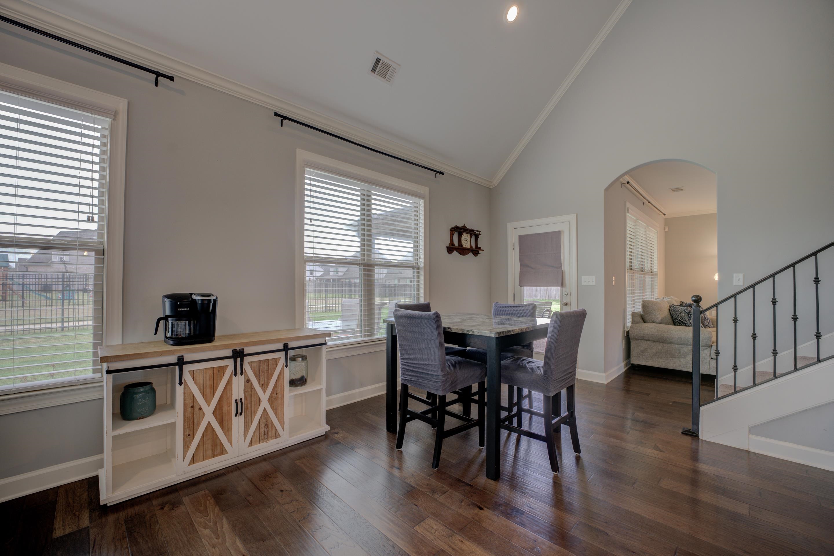 6374 Rutherford Circle Arlington, TN 38002 - Photo 22 of 40 a view of a dining room with furniture and wooden floor