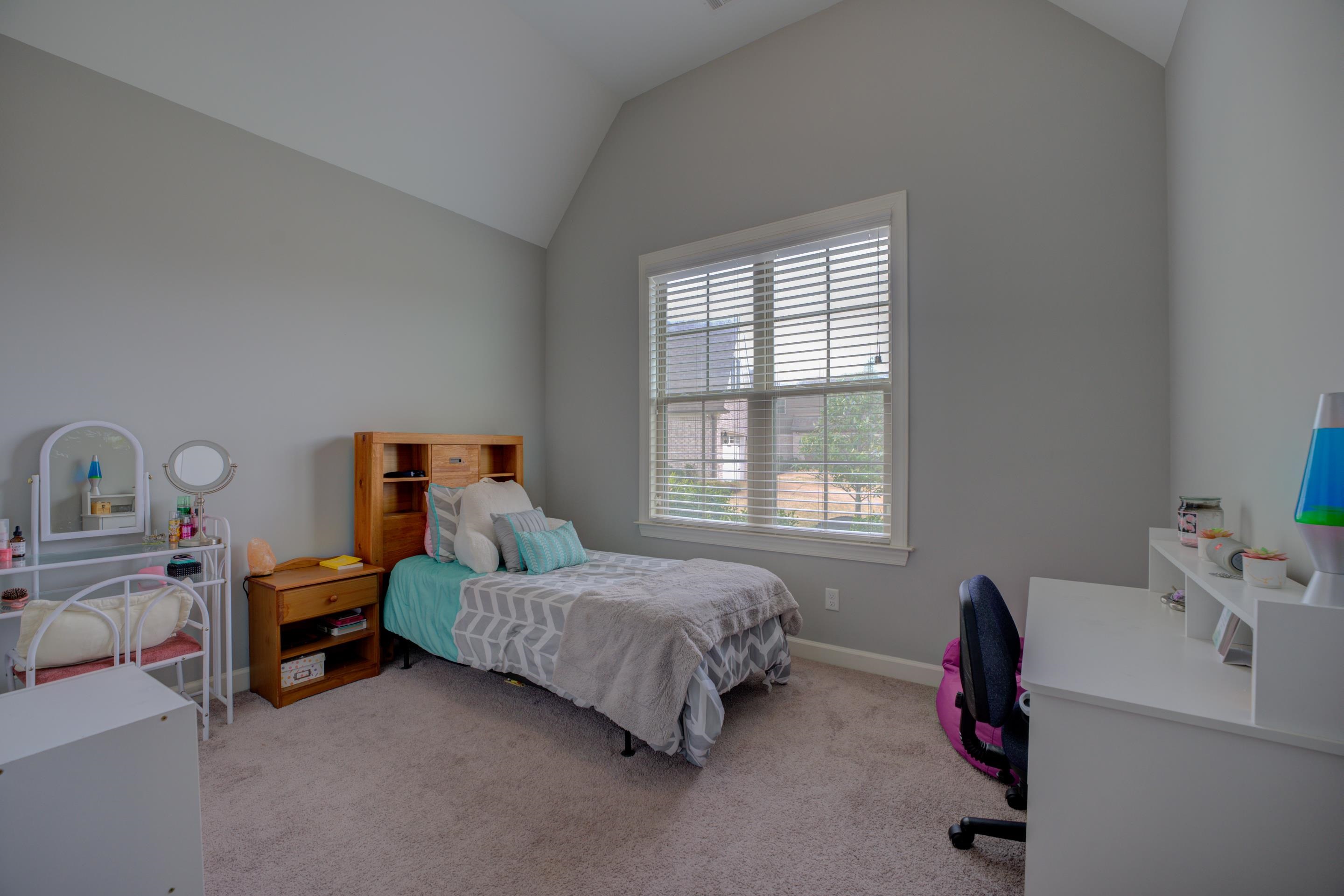 6374 Rutherford Circle Arlington, TN 38002 - Photo 35 of 40 a bedroom with a bed and a window