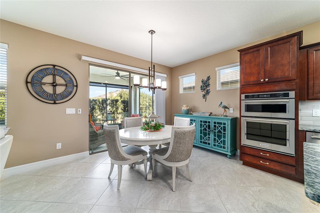 6382 Southwest 97th Terrace Road Ocala, FL 34481 - Photo 16 of 56 a dining room with furniture and window
