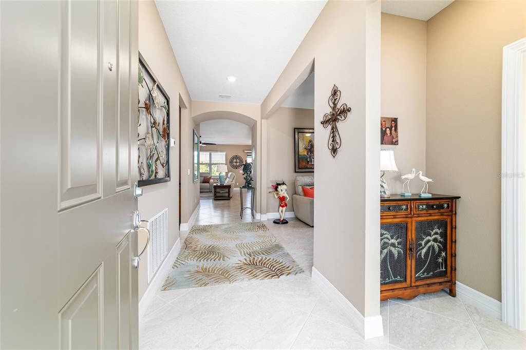 6382 Southwest 97th Terrace Road Ocala, FL 34481 - Photo 2 of 56 a view of a hallway view with staircase