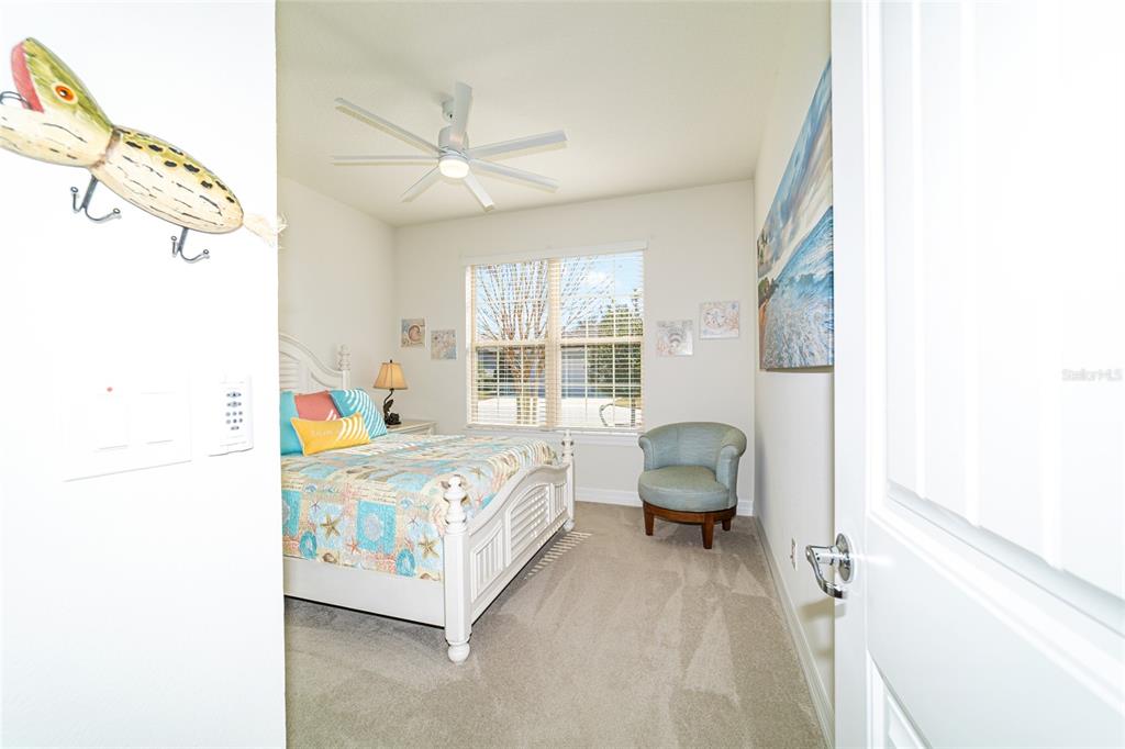 6382 Southwest 97th Terrace Road Ocala, FL 34481 - Photo 28 of 56 a spacious bedroom with a bed and window