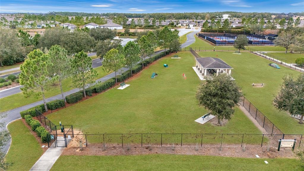 6382 Southwest 97th Terrace Road Ocala, FL 34481 - Photo 56 of 56 a view of a city with lawn chairs