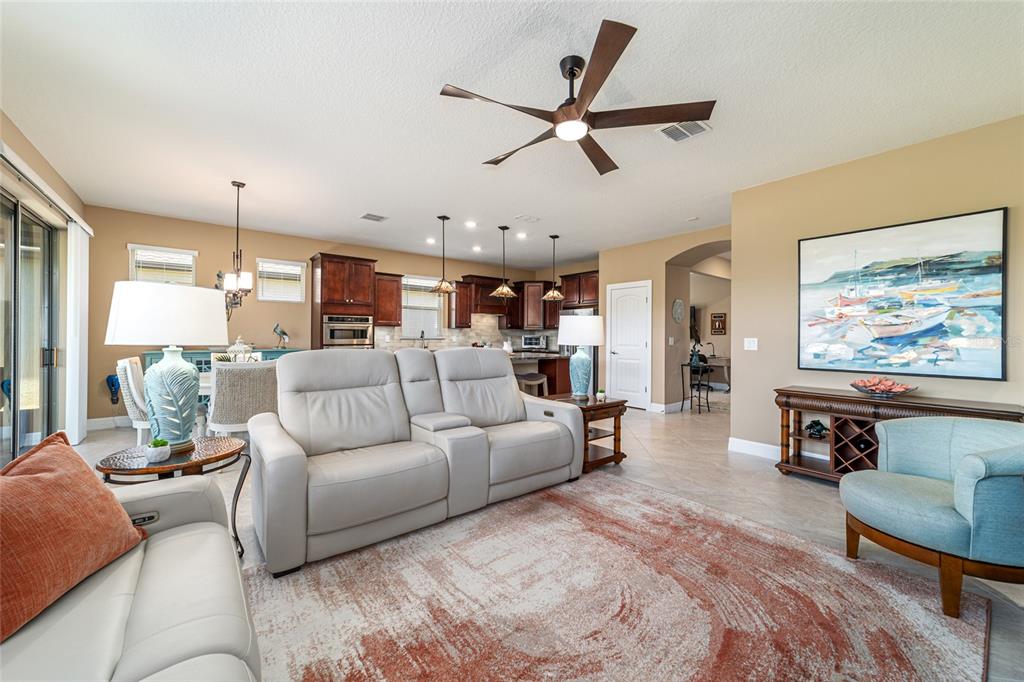 6382 Southwest 97th Terrace Road Ocala, FL 34481 - Photo 9 of 56 a living room with furniture and a large window