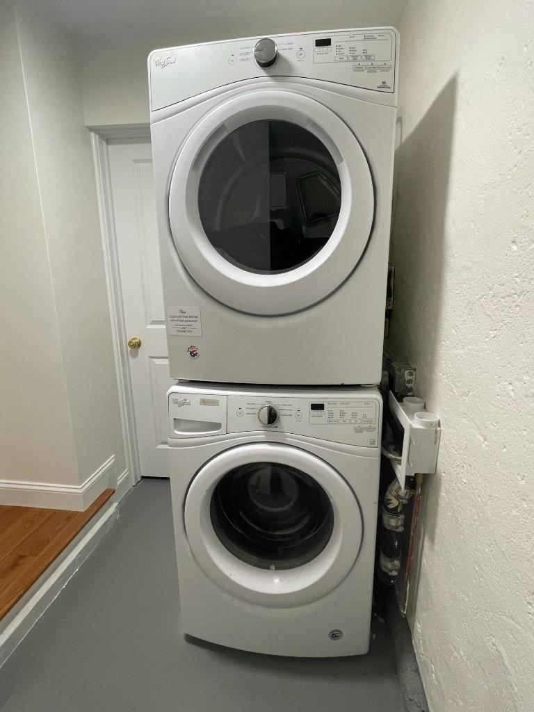 682 East 42nd Street, Unit 1 Brooklyn, NY 11203 - Photo 9 of 11 a utility room with dryer and washer