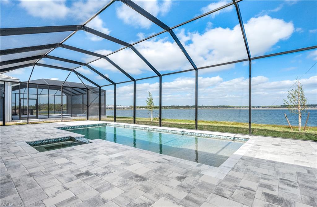 9127 Wisteria Way Naples, FL 34114 - Photo 10 of 50 a view of a backyard