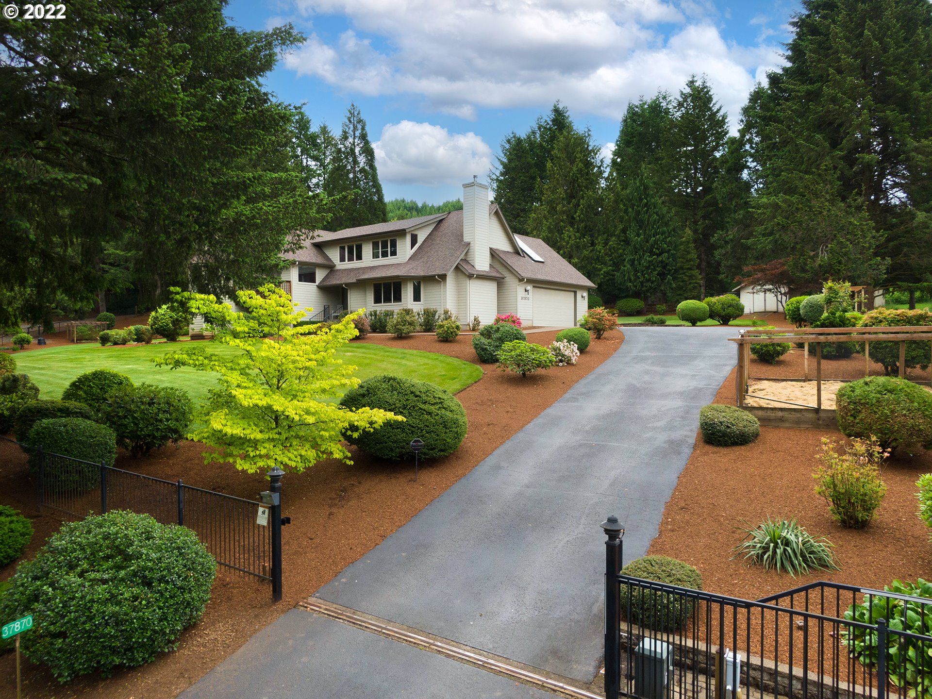 37870 Shenandoah Loop Springfield, OR 97478 - Photo 1 of 32 a front view of a house with a yard and outdoor seating