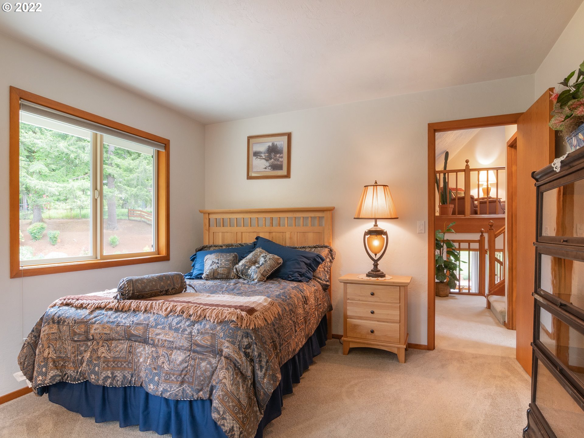 37870 Shenandoah Loop Springfield, OR 97478 - Photo 15 of 32 a bedroom with a bed and a window