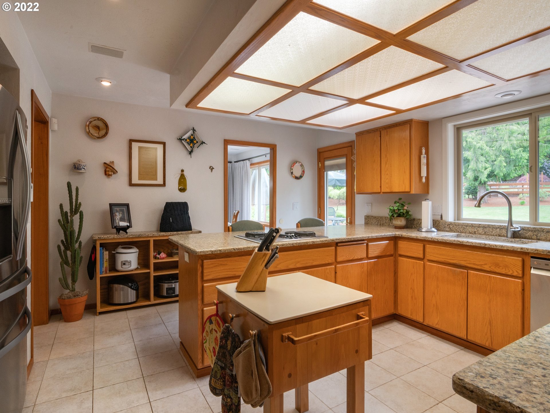 37870 Shenandoah Loop Springfield, OR 97478 - Photo 7 of 32 a kitchen with stainless steel appliances granite countertop a sink and a refrigerator