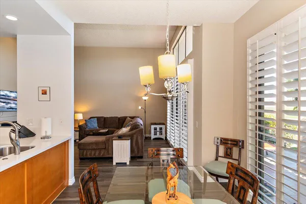 a view of a workspace with furniture and a livingroom