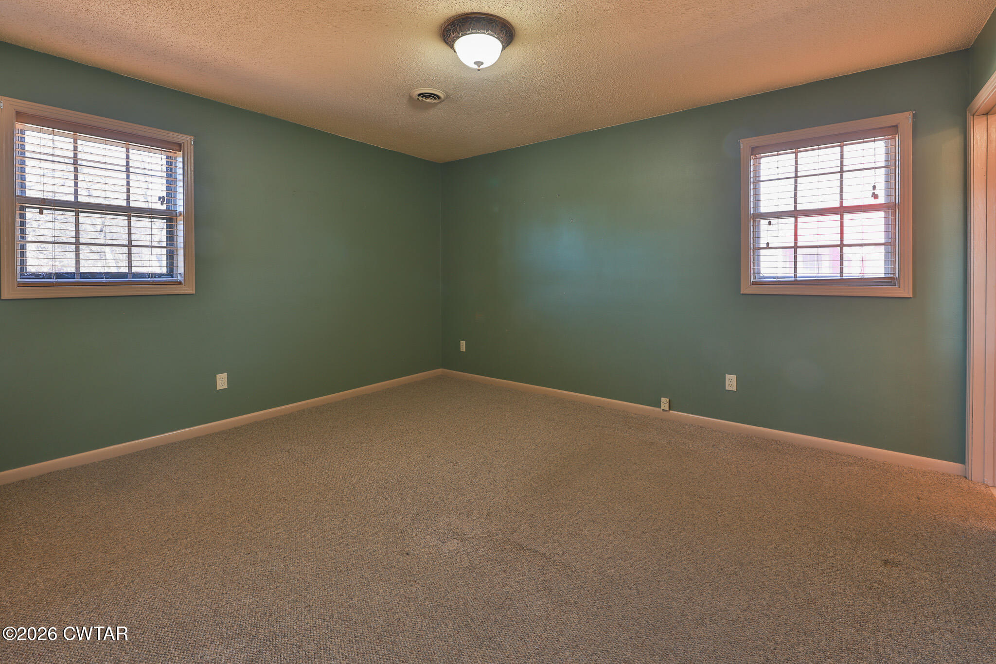 295 Adams Road Greenfield, TN 38230 - Photo 11 of 35 an empty room with a window