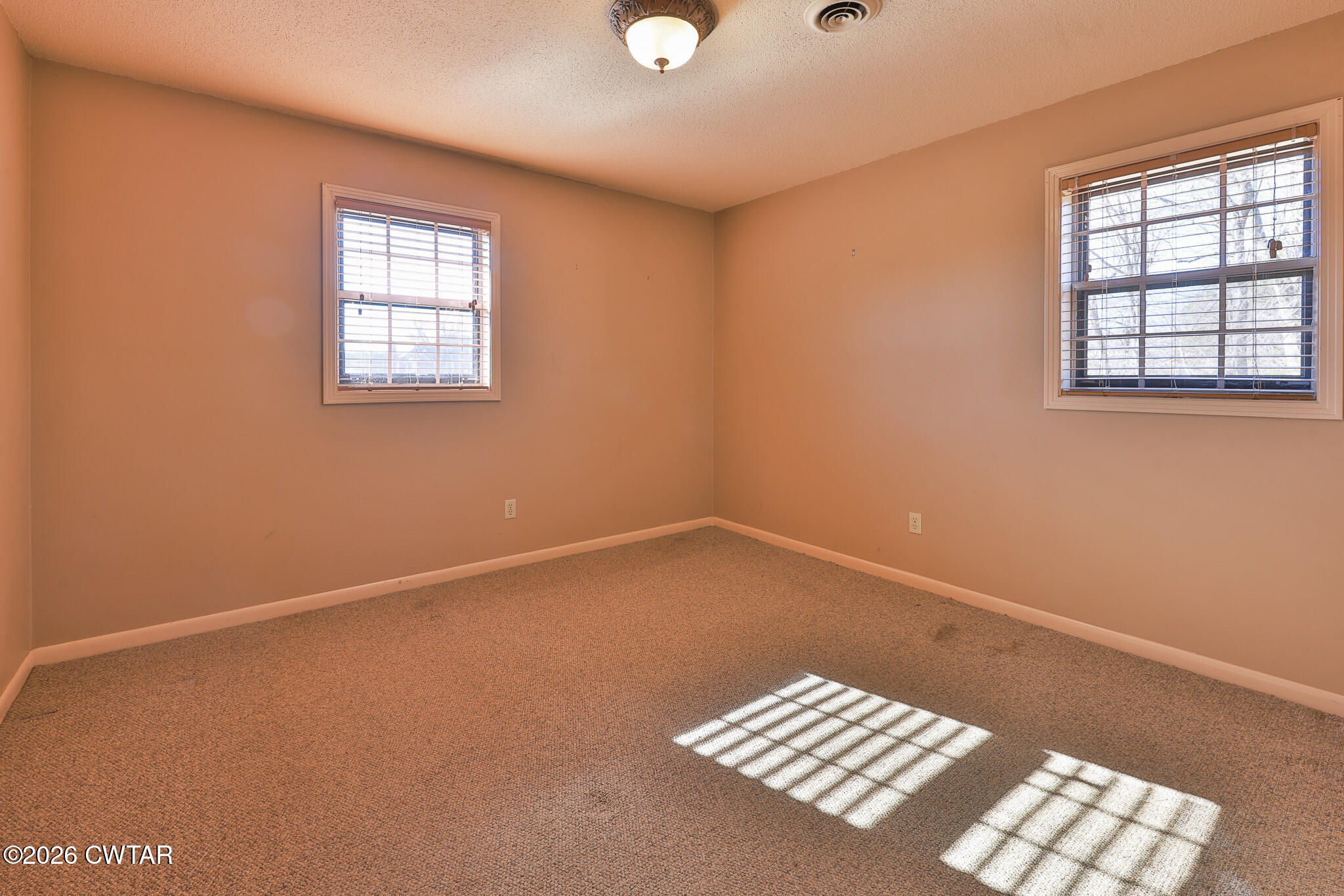 295 Adams Road Greenfield, TN 38230 - Photo 13 of 35 an empty room with windows