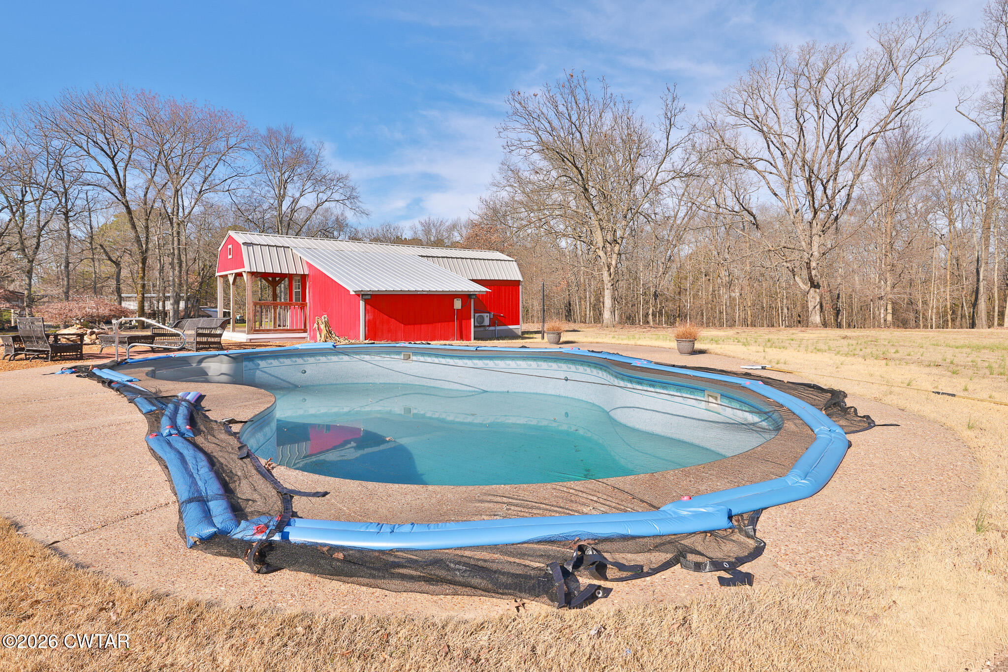 295 Adams Road Greenfield, TN 38230 - Photo 15 of 35 a view of a swimming pool with an outdoor space