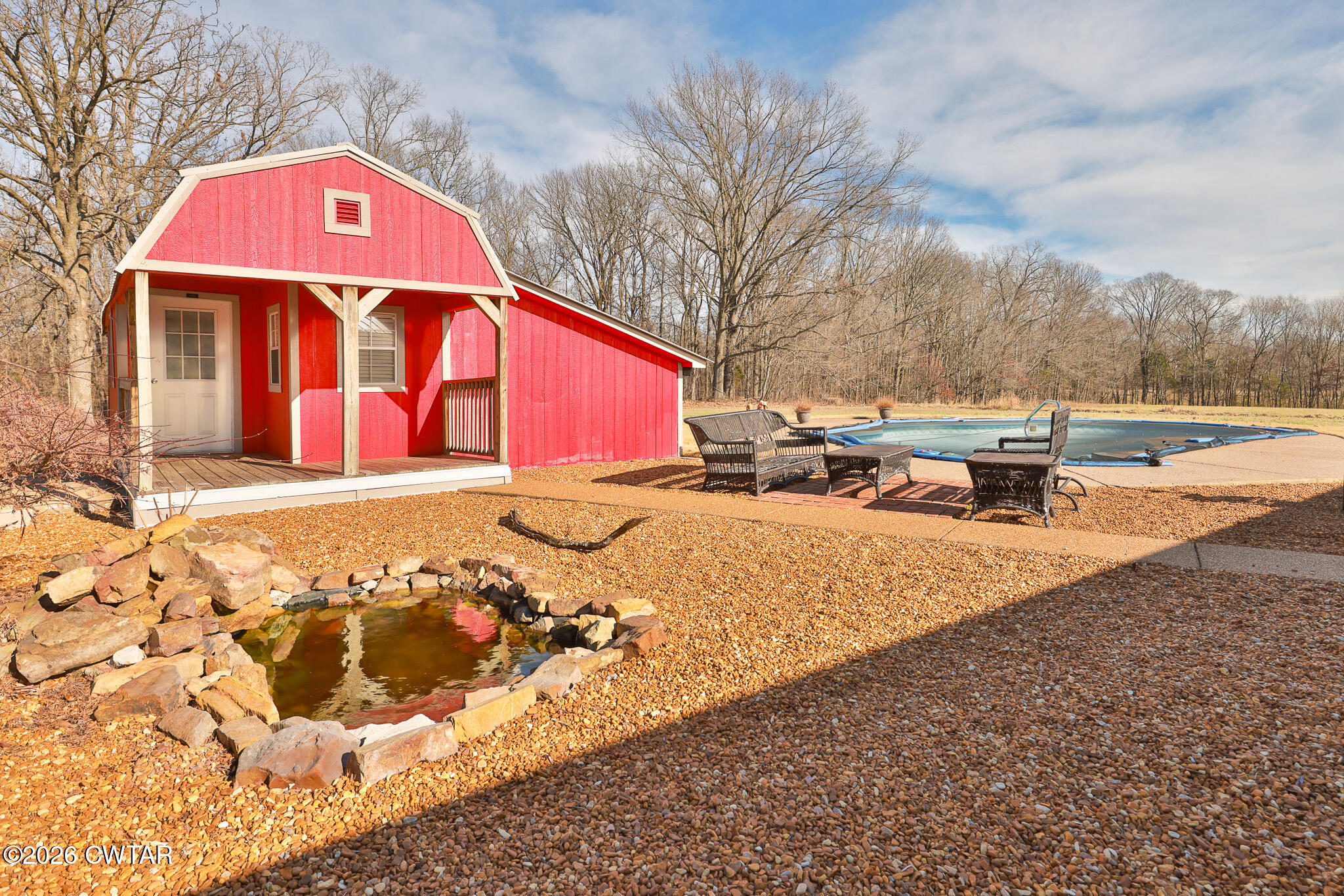295 Adams Road Greenfield, TN 38230 - Photo 16 of 35 a front view of a house with a yard
