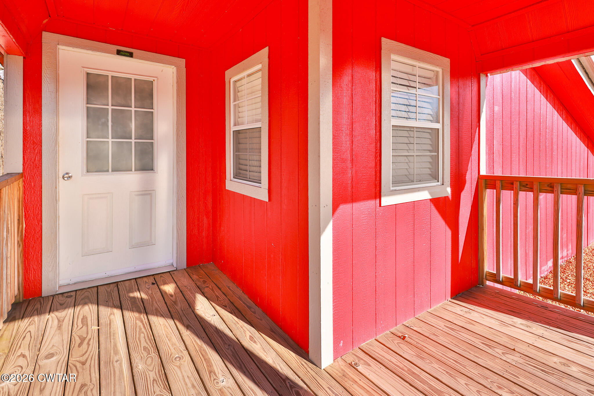 295 Adams Road Greenfield, TN 38230 - Photo 17 of 35 a view of a bedroom with wooden floor and stairs