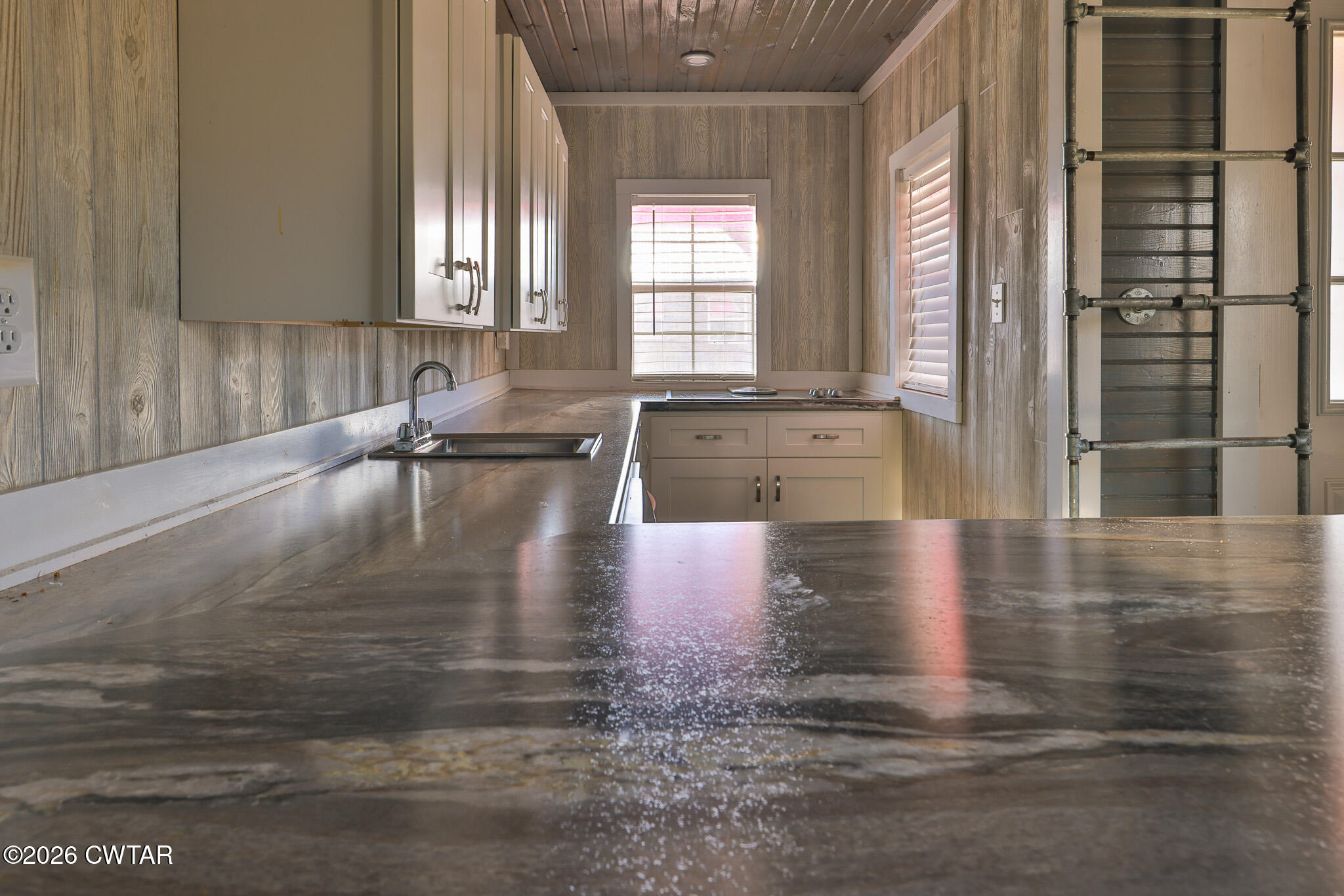 295 Adams Road Greenfield, TN 38230 - Photo 19 of 35 a view of a kitchen with a window