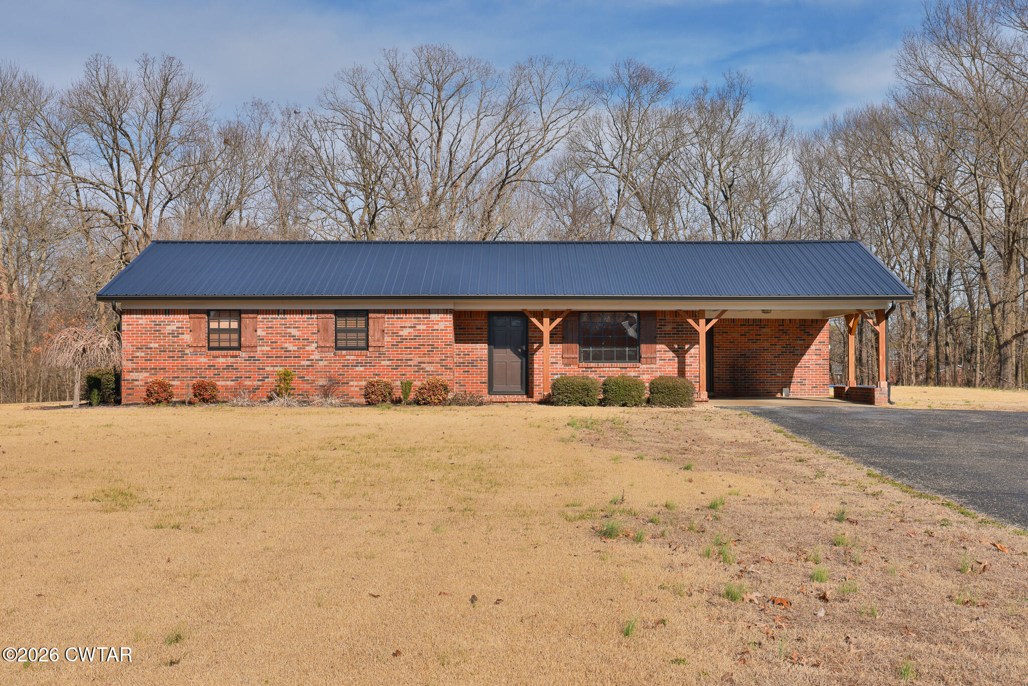 295 Adams Road Greenfield, TN 38230 - Photo 31 of 35 a front view of house with yard