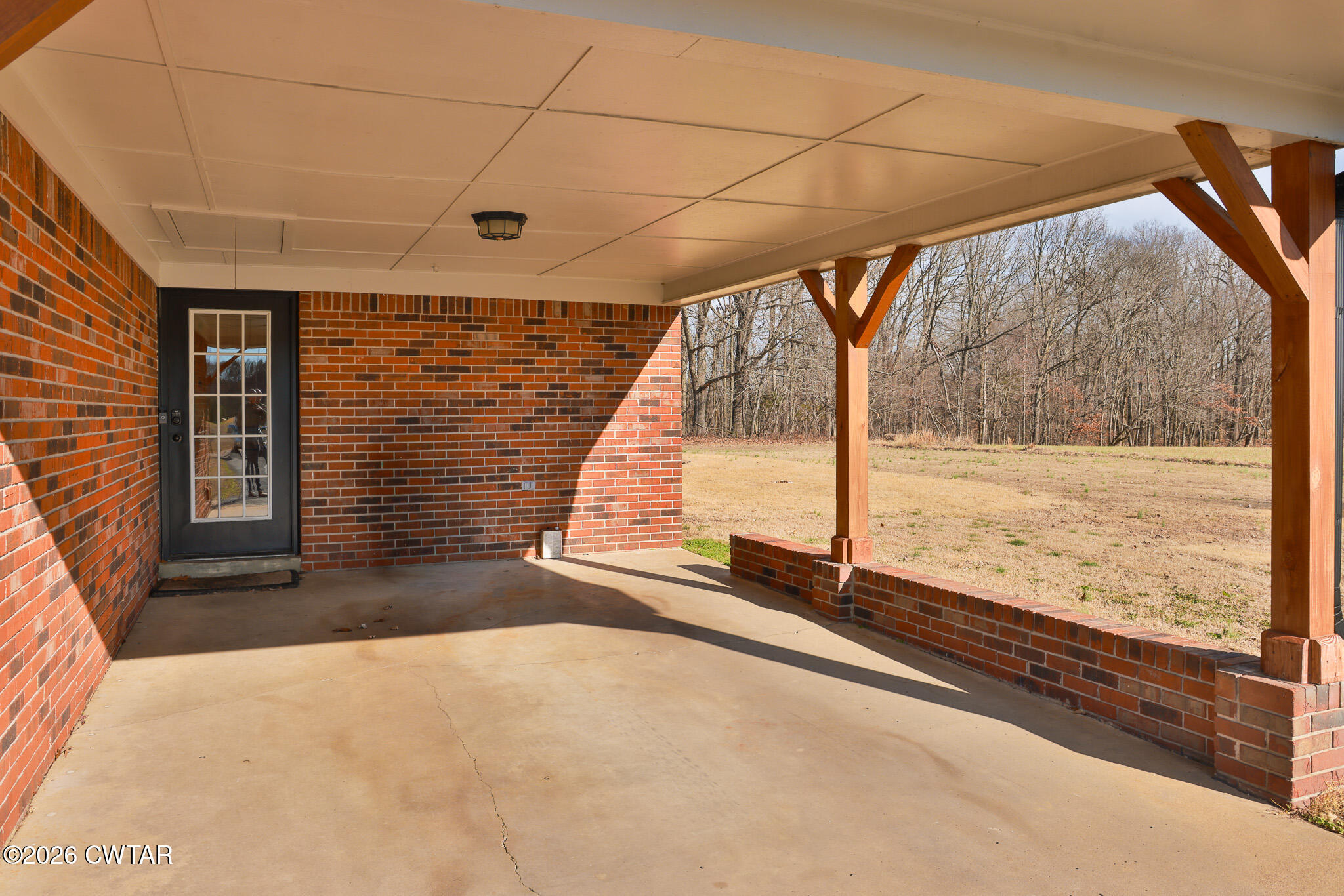 295 Adams Road Greenfield, TN 38230 - Photo 34 of 35 a view of an empty room with wooden floor
