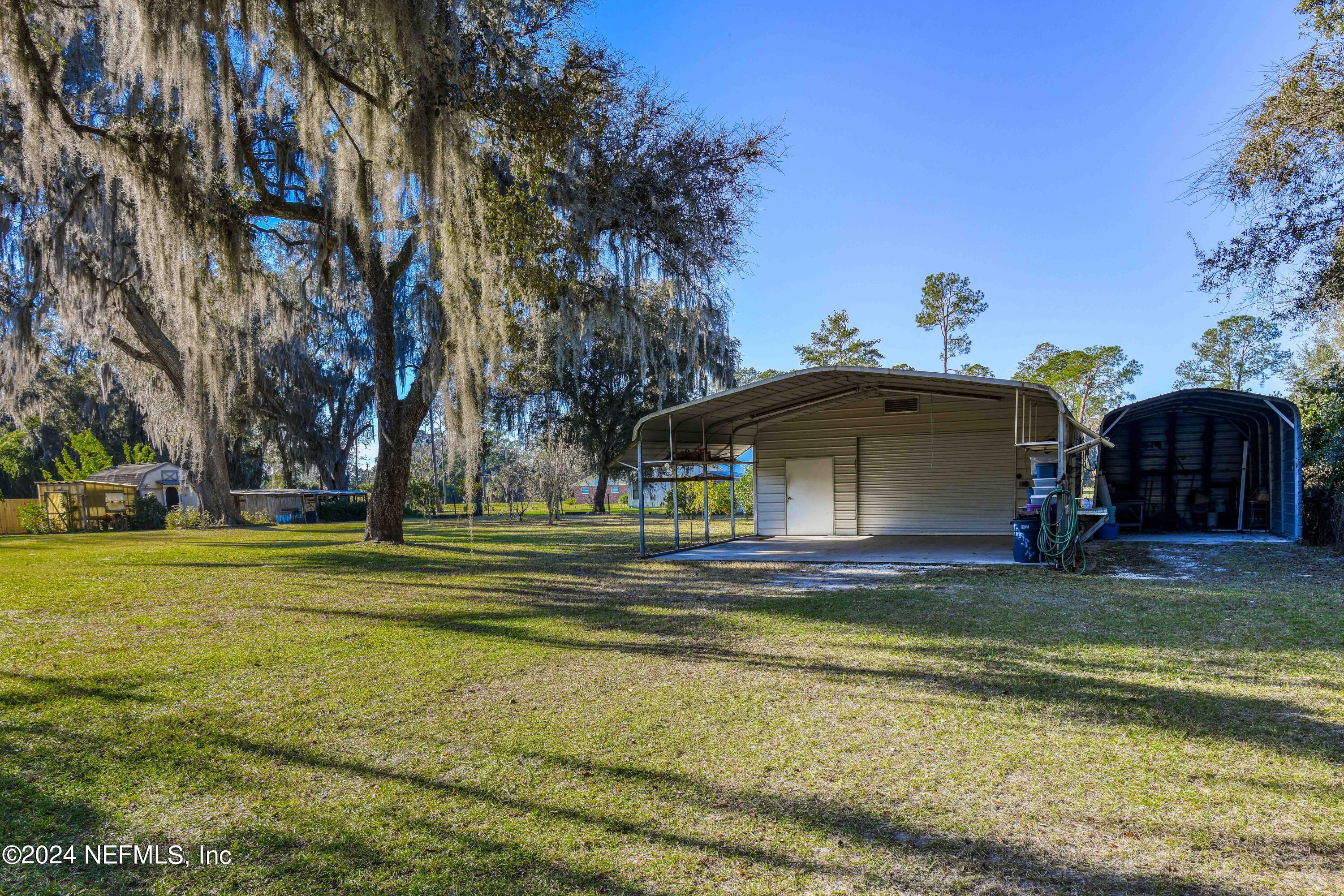 390 East End Road San Mateo, FL 32187 - Photo 3 of 54 Garage/workshop