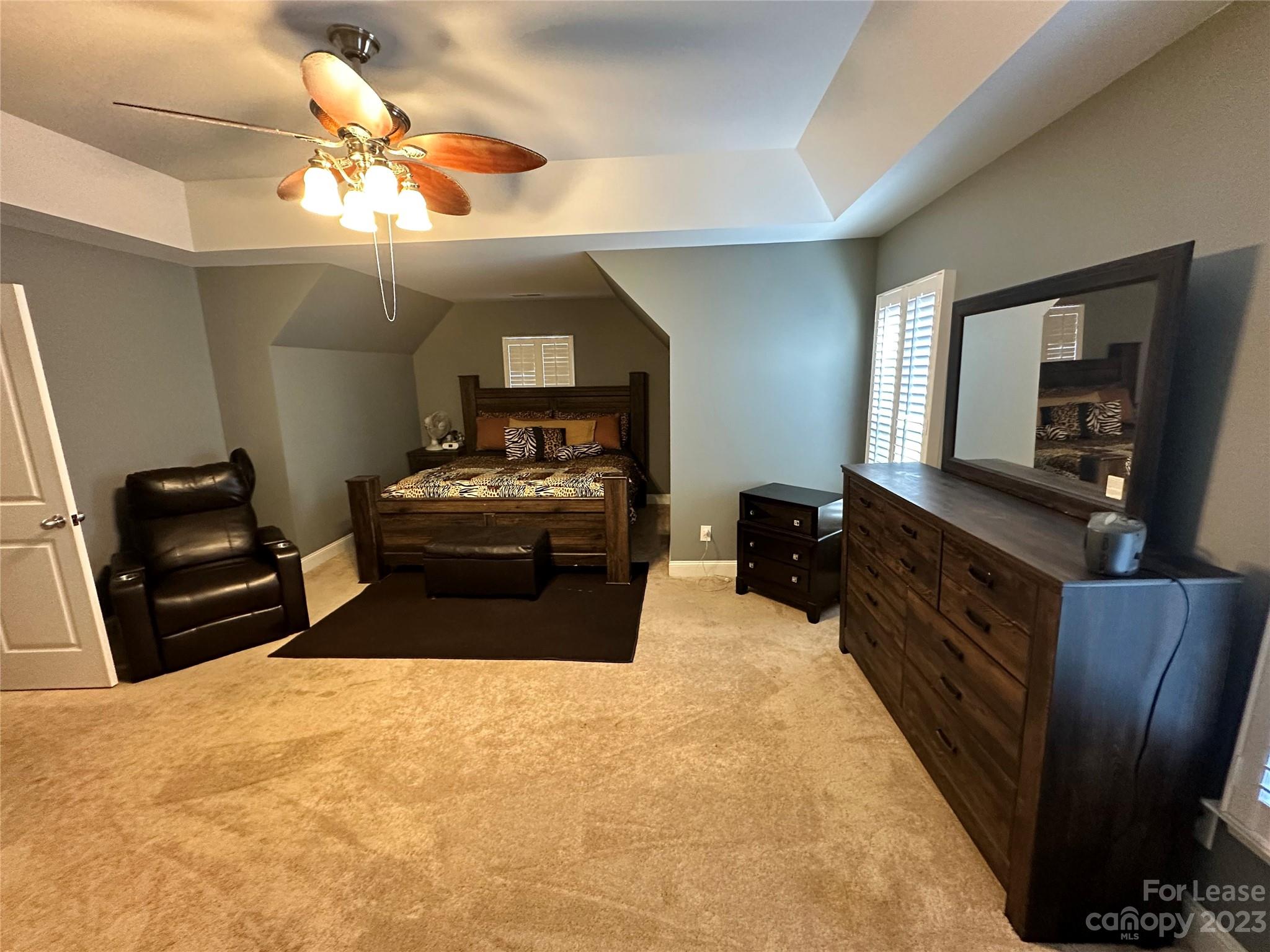 109 Windstone Drive Troutman, NC 28166 - Photo 12 of 22 a living room with furniture and a flat screen tv