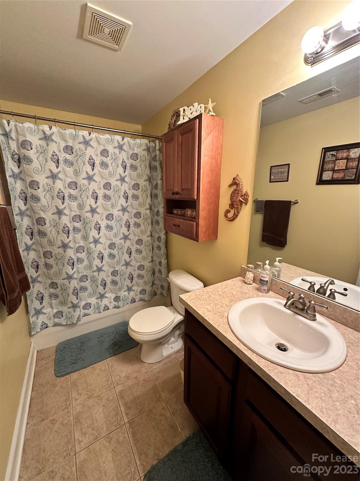 109 Windstone Drive Troutman, NC 28166 - Photo 16 of 22 a bathroom with a sink toilet and shower