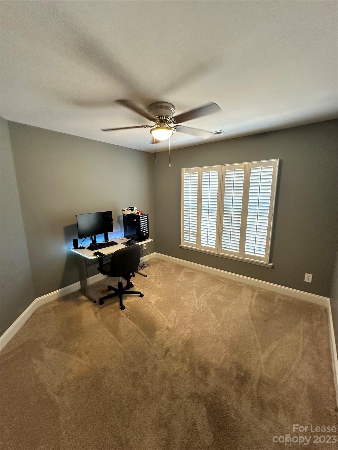 109 Windstone Drive Troutman, NC 28166 - Photo 17 of 22 a living room with furniture and a large window