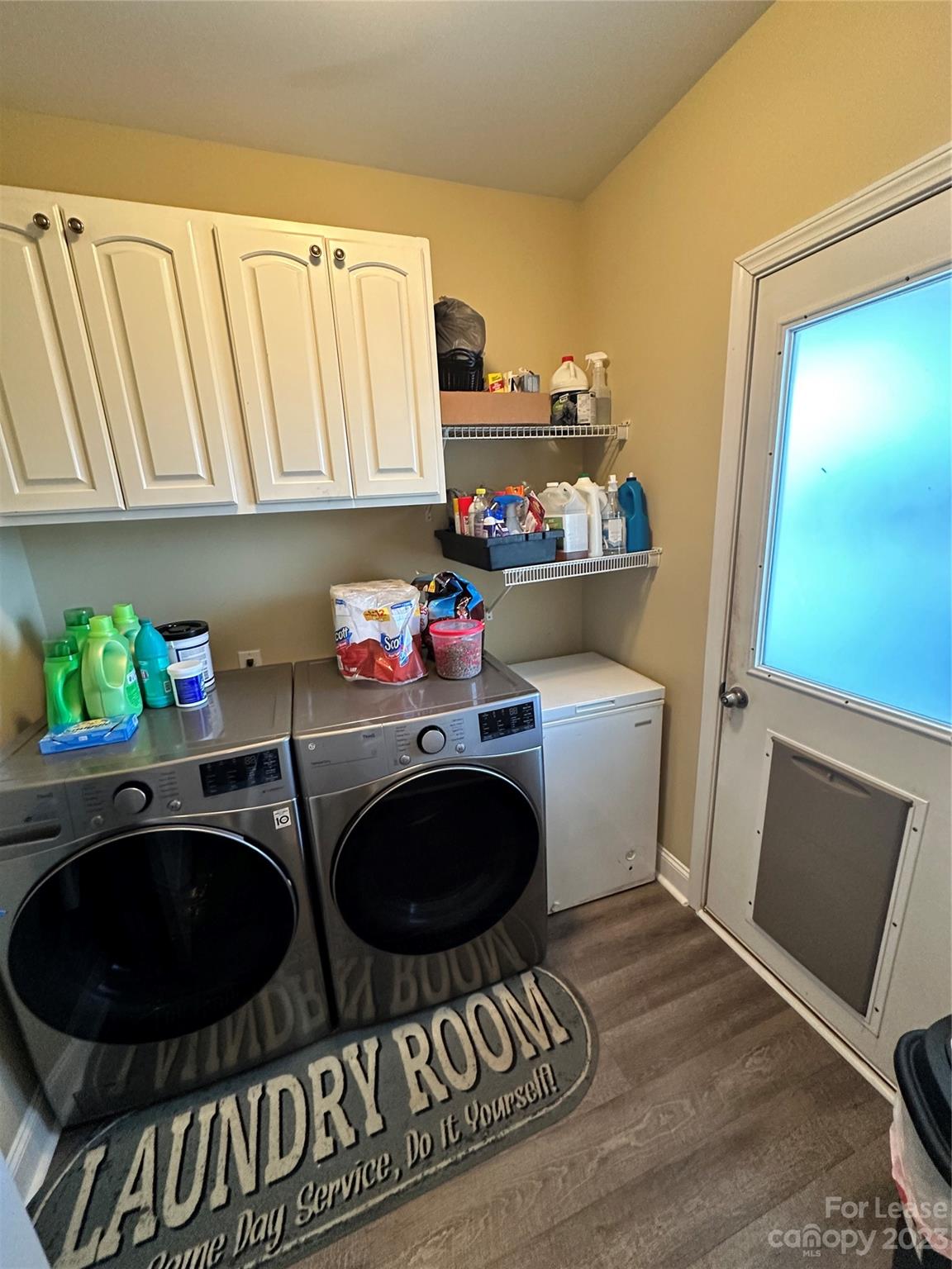 109 Windstone Drive Troutman, NC 28166 - Photo 18 of 22 a kitchen with a sink a stove and cabinets