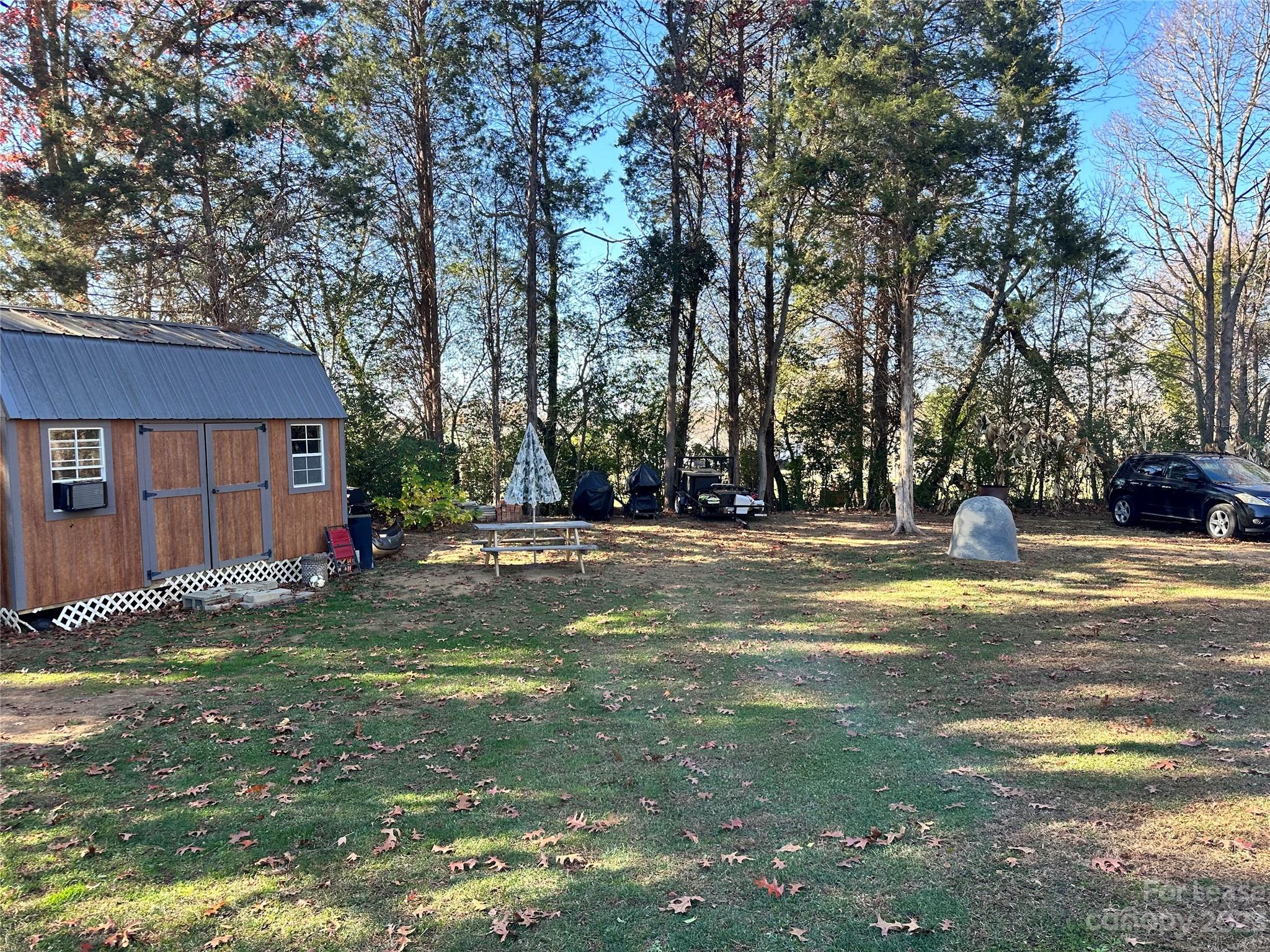 109 Windstone Drive Troutman, NC 28166 - Photo 19 of 22 a view of a house with a yard