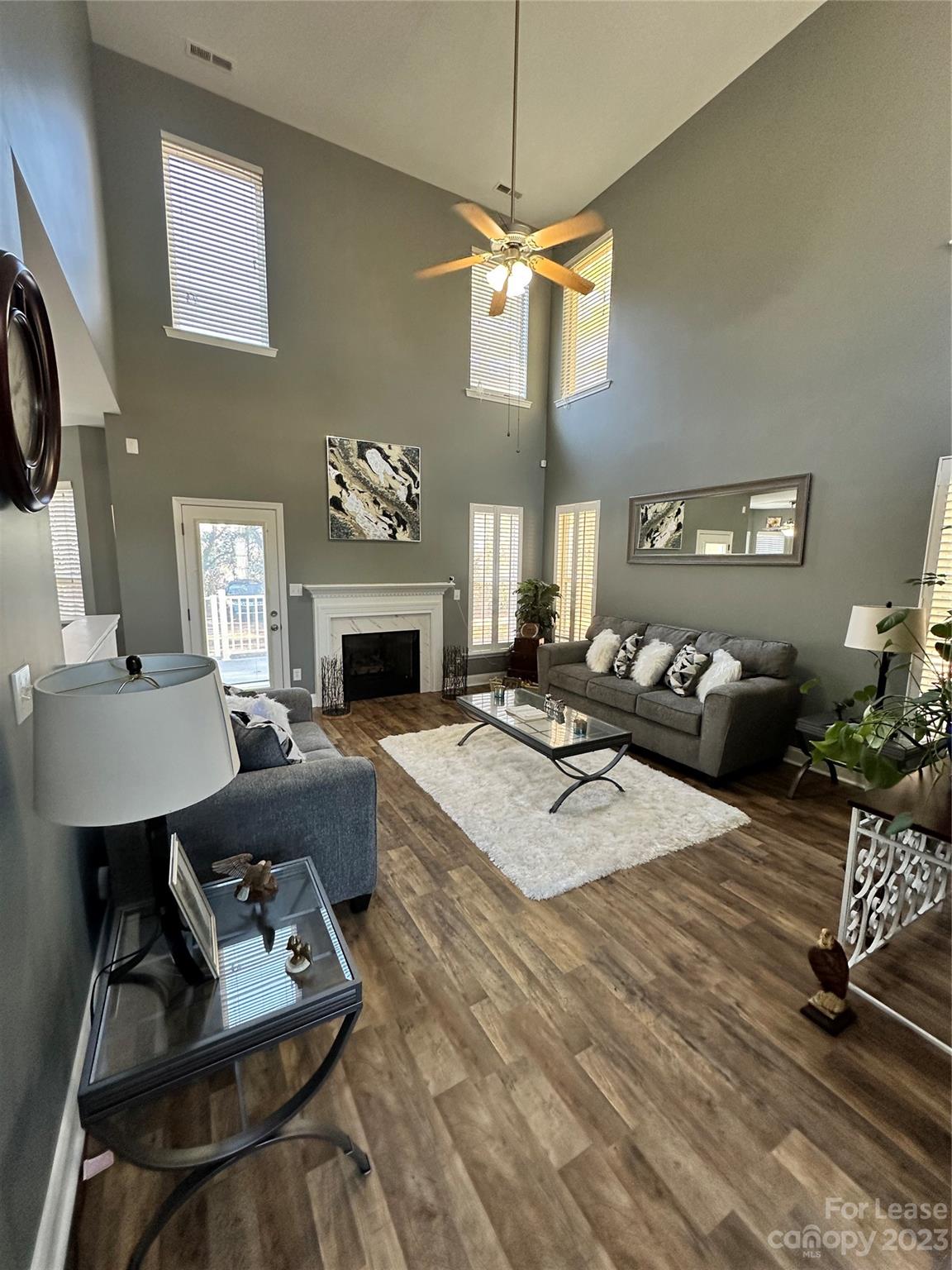 109 Windstone Drive Troutman, NC 28166 - Photo 2 of 22 a living room with furniture fireplace and window
