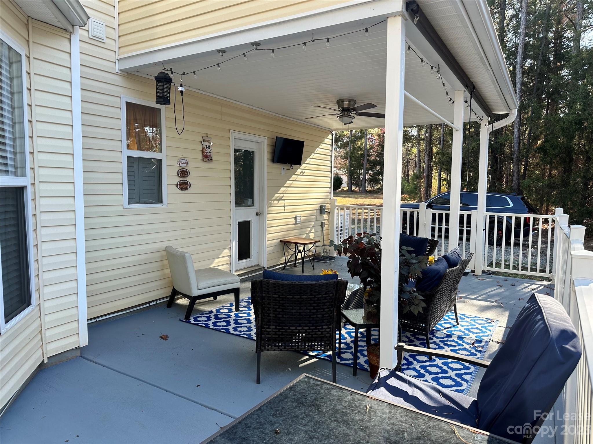 109 Windstone Drive Troutman, NC 28166 - Photo 22 of 22 a view of a patio with couple of chairs