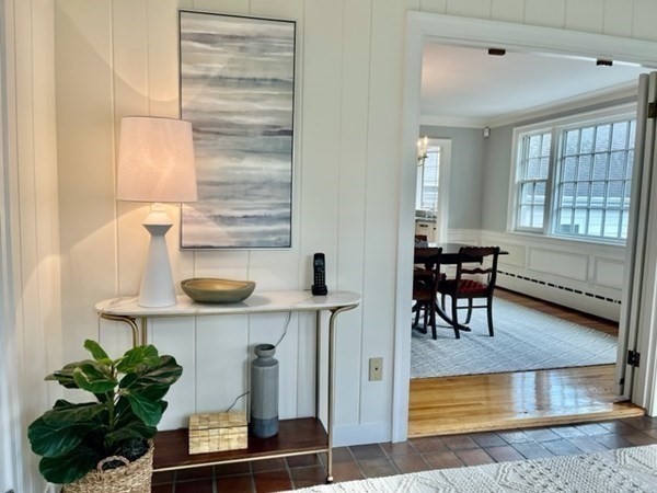 31 Lathrop Road Wellesley, MA 02482 - Photo 16 of 27 a living room with furniture and a potted plant
