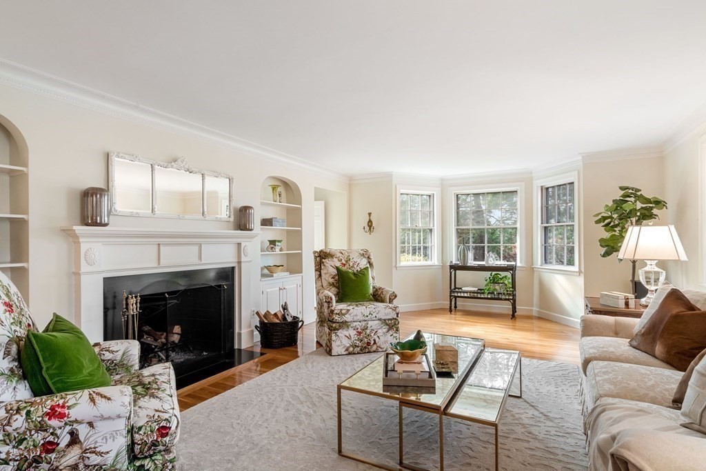 31 Lathrop Road Wellesley, MA 02482 - Photo 6 of 27 a living room with furniture and a fireplace