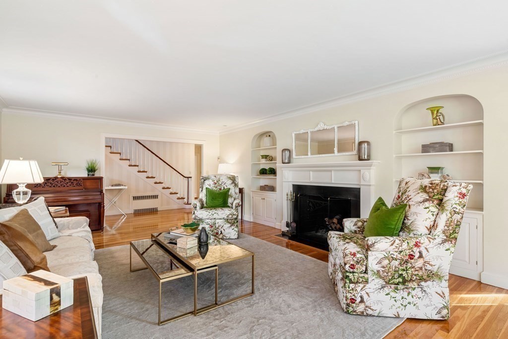 31 Lathrop Road Wellesley, MA 02482 - Photo 7 of 27 a living room with furniture and a fireplace