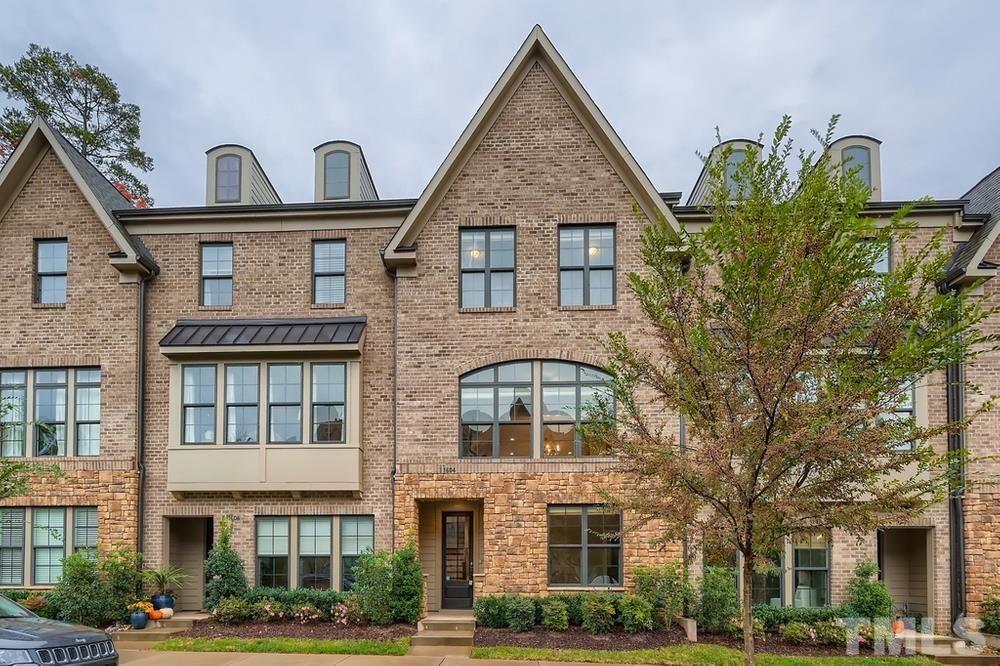 1604 Bowery Drive Raleigh, NC 27607 - Photo 1 of 28 a front view of residential houses with yard