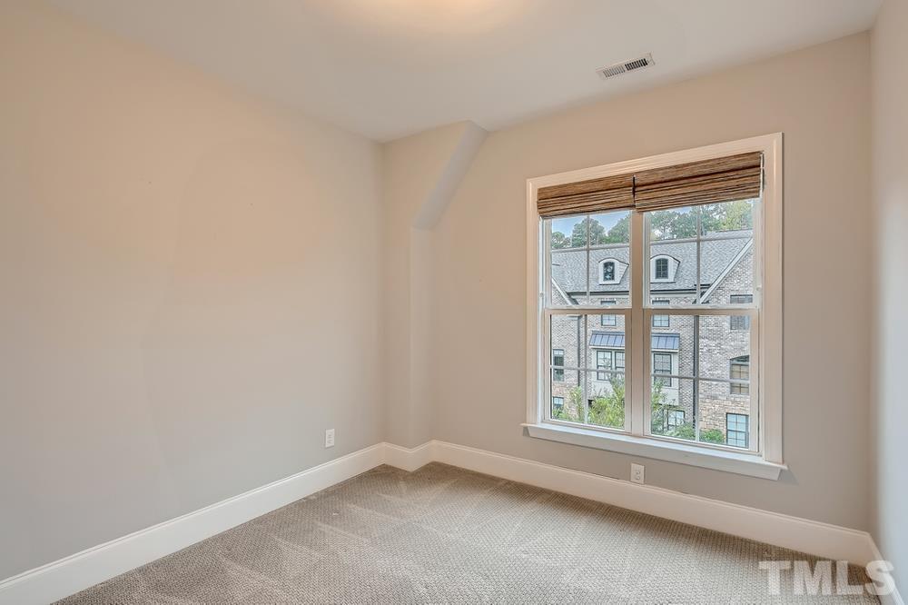 1604 Bowery Drive Raleigh, NC 27607 - Photo 17 of 28 an empty room with windows